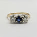 Front view of vintage sapphire and diamond three-stone ring in 14kt gold