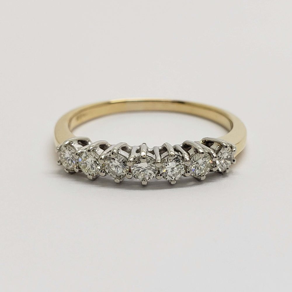 Front view of vintage seven-stone diamond ring in 18kt yellow and white gold