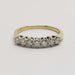 Front view of vintage seven-stone diamond ring in 18kt yellow and white gold