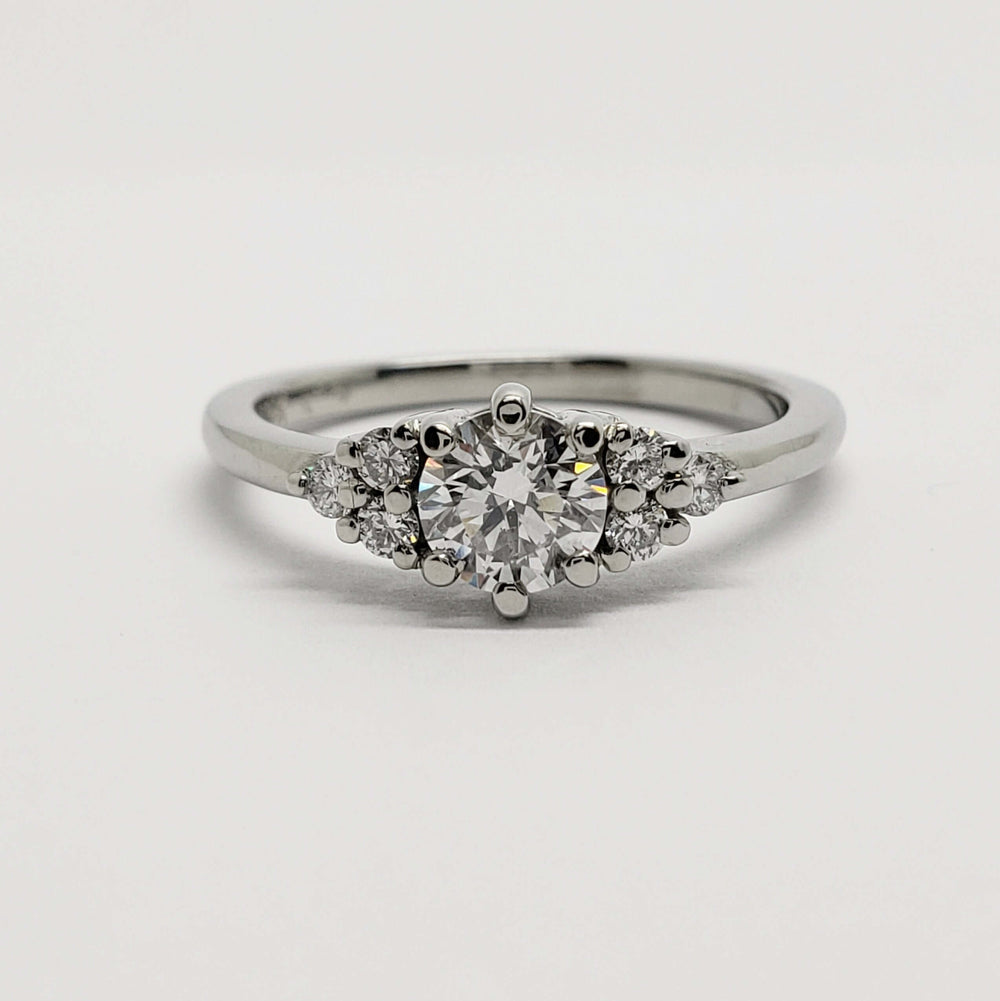 Front view of 14kt white gold engagement ring with round lab-grown diamonds