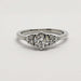 Front view of 14kt white gold engagement ring with round lab-grown diamonds