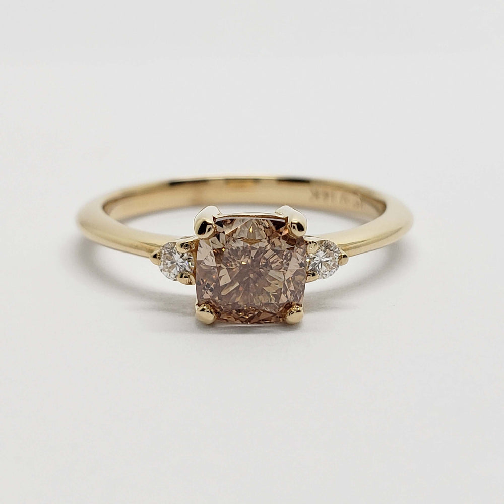 Front view of 14kt yellow gold ring with cushion-cut champagne diamond and side diamonds