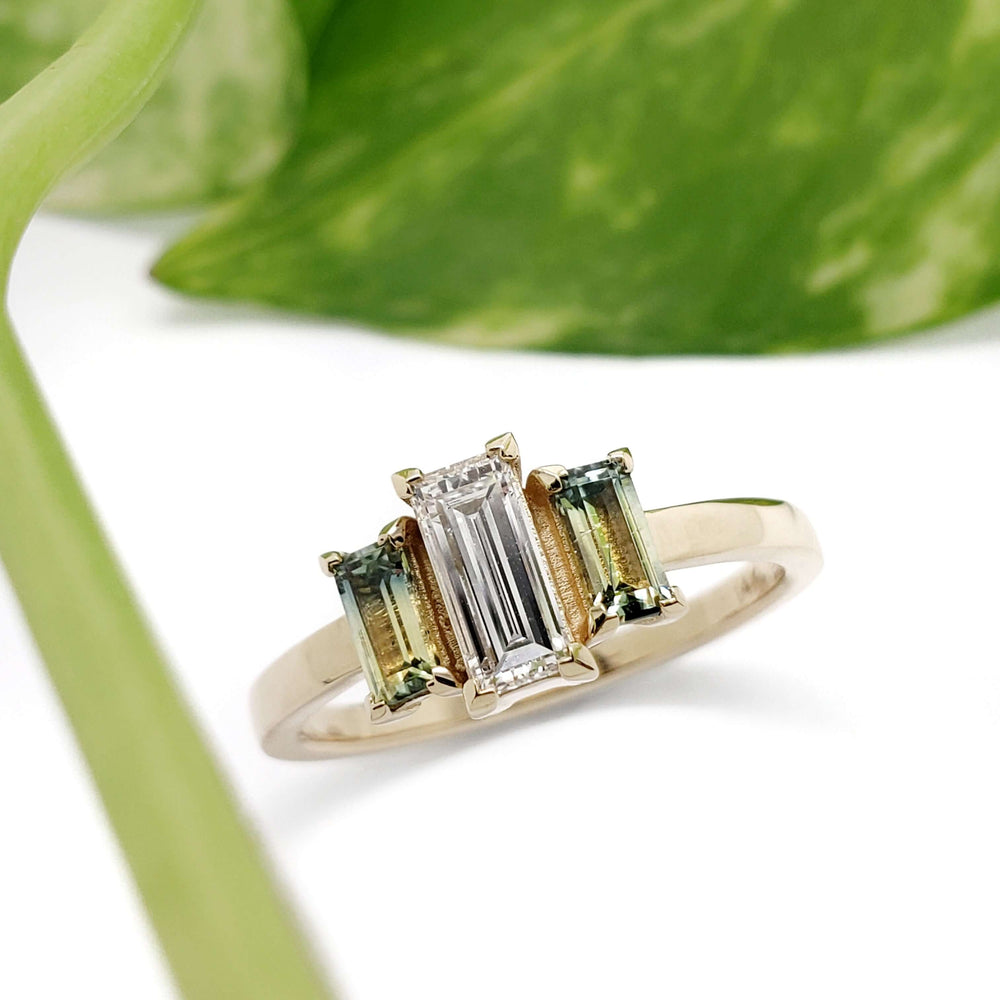 Front view of 14kt yellow gold ring with Canadian diamond and Australian sapphires