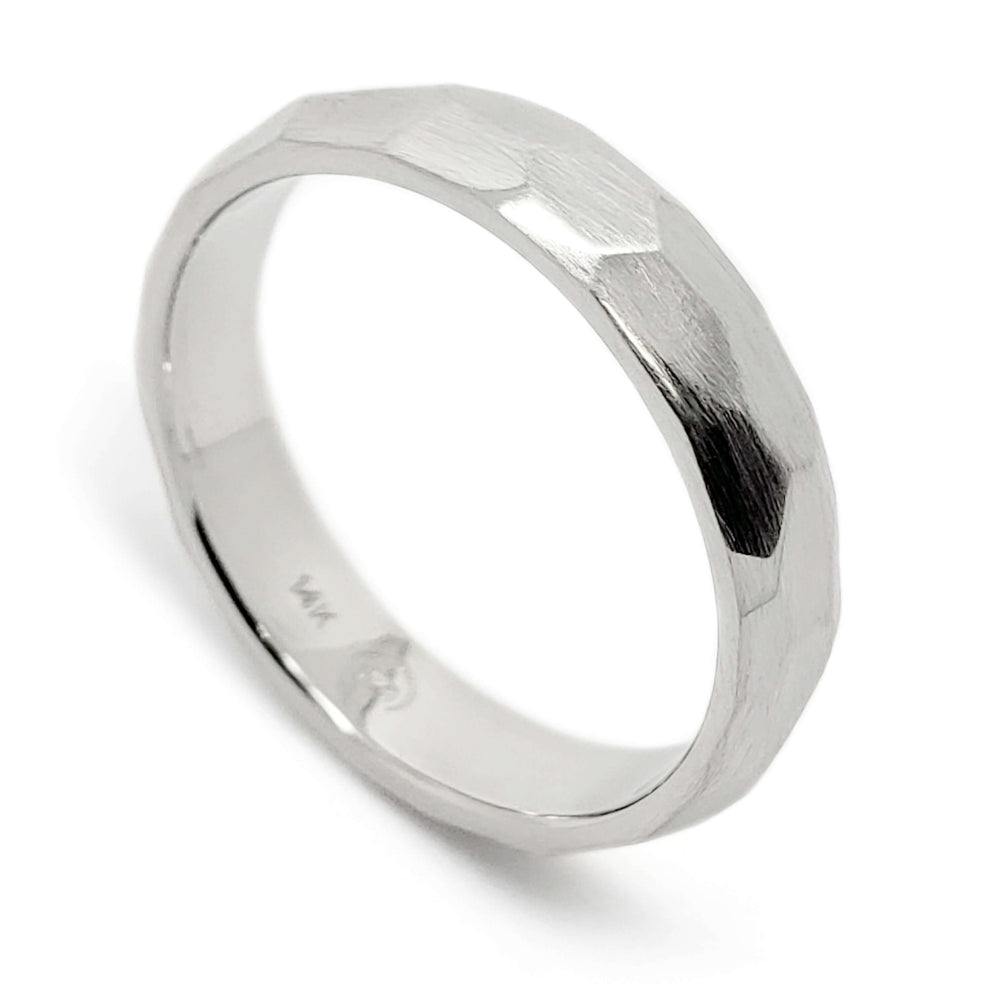 Hand-carved 14kt white gold wedding ring with faceted brushed texture