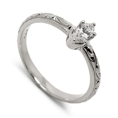 Hand-engraved 14kt white gold ring with marquise lab diamond in six-claw setting
