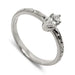 Hand-engraved 14kt white gold ring with marquise lab diamond in six-claw setting
