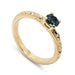 Hand-engraved 14kt yellow gold engagement ring with blue Montana sapphire in claw setting