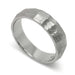Hand carved 14kt white gold wedding ring with rugged faceted texture, studio view