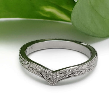 Hand engraved 14kt white gold chevron wedding ring with floral and wheat motif, millgrain detail