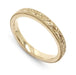 Hand engraved 14kt yellow gold wedding ring with floral and millgrain detailing