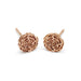 Pair of handcrafted 14kt rose gold floral rose stud earrings on white background