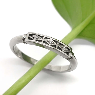 Handcrafted 14kt white gold diamond wedding ring with geometric Art Deco design