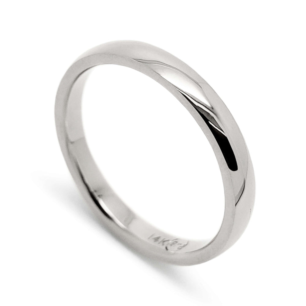 Handcrafted 14kt white gold low dome wedding ring with high polished finish