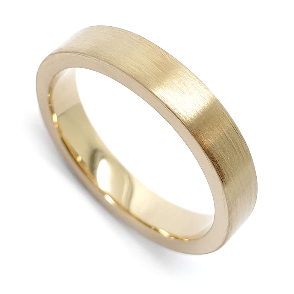 Handcrafted 14kt yellow gold wedding band with brushed finish and flat profile