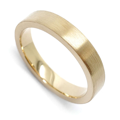 Handcrafted 14kt yellow gold wedding band with brushed finish and flat profile