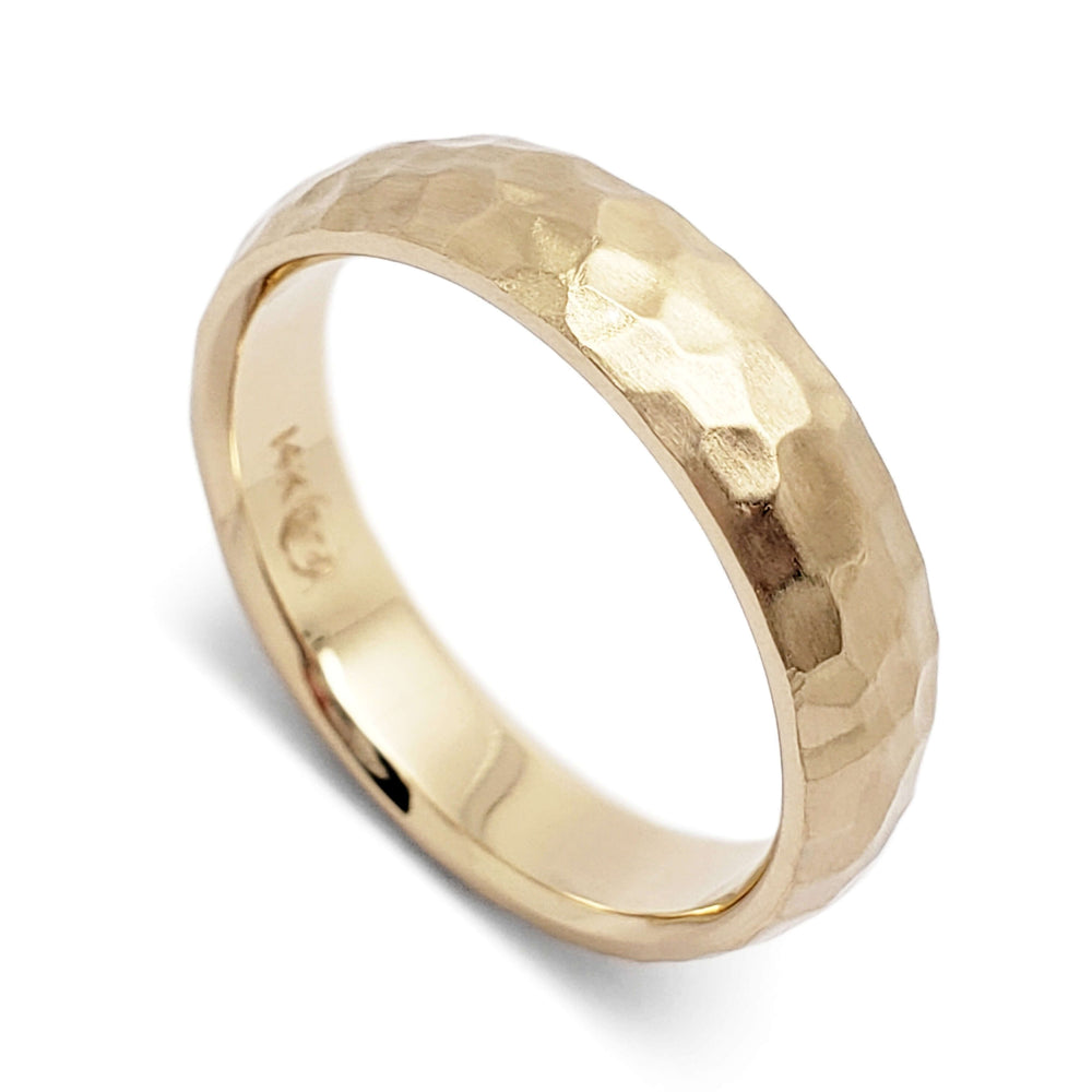 Handcrafted 14kt yellow gold wedding ring with hammered and brushed texture