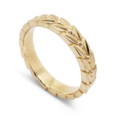 Handcrafted 14kt yellow gold wedding ring with engraved leaf detail