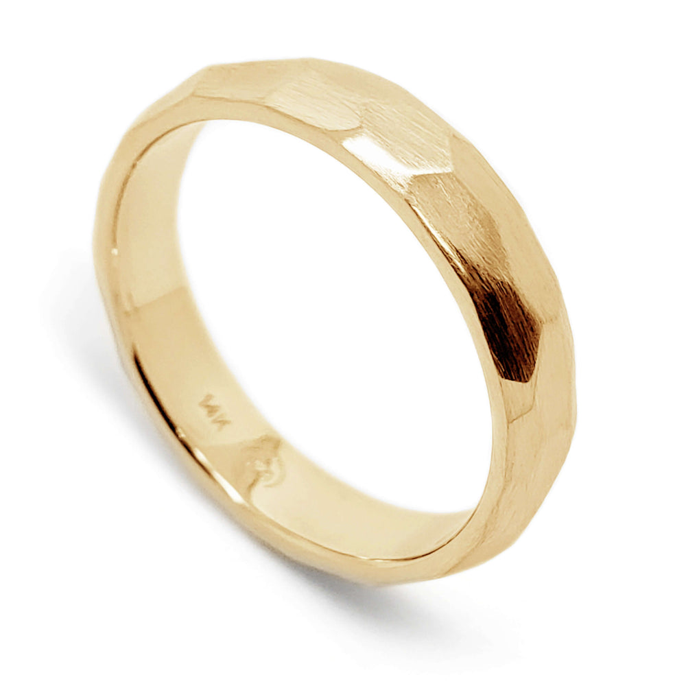 Handcrafted 14kt yellow gold wedding ring with faceted brushed surface