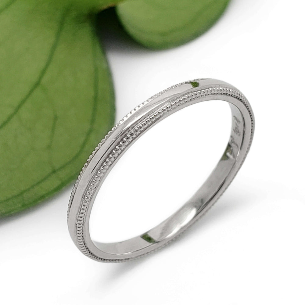Platinum wedding band with millgrained edge, handcrafted by Vancouver jewellers