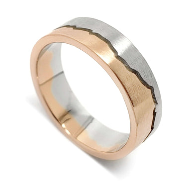 Handcrafted two tone wedding ring in 14k white and rose gold with mountain range design