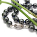 Hematite bead necklace with ribbed silver fish hook clasp detail