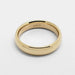 Interior view of 14kt yellow gold low dome wedding ring showing hallmark
