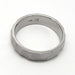 Interior view of handcrafted 14kt white gold wedding ring with faceted texture