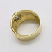 Interior view of wide 18kt yellow gold engraved vintage ring with diamond setting