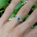 14kt white gold engagement ring with lavender sapphire and lab diamonds, worn on hand