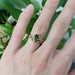 Leafy rose gold wedding band with diamond stacked with green sapphire and diamond rings