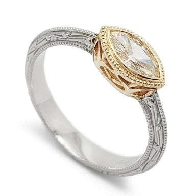 Leela engagement ring in 14k yellow and white gold with marquise champagne diamond, filigree bezel and hand engraving