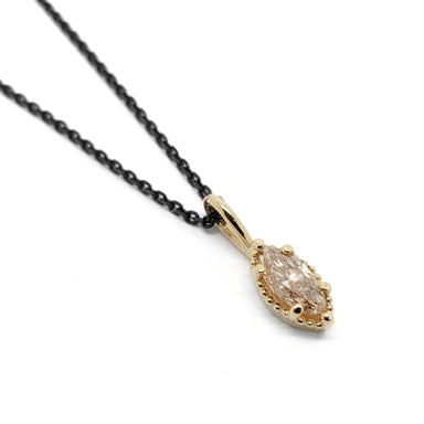 Marquise cut champagne diamond pendant in 14kt yellow gold on a black chain