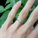 Marquise lab diamond engagement ring in white gold shown on hand