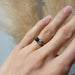 Moi et toi sapphire and lab diamond engagement ring in white gold shown on hand