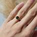 14kt yellow gold Montana sapphire and diamond ring shown on a hand