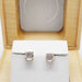 14kt yellow gold moonstone cabochon stud earrings presented in an Era Design box