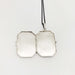 Open vintage sterling silver locket showing the two inner compartments
