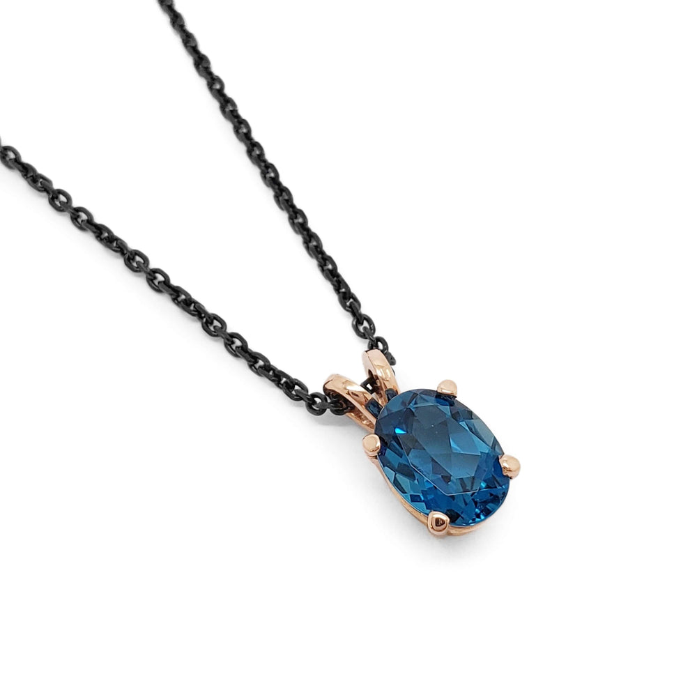 Oval London topaz pendant in 14kt rose gold on a black chain