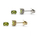 Pair of oval cut green peridot stud earrings in 14kt yellow and white gold with floral basket setting