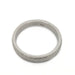 Overhead view of 14kt white gold elephant skin texture wedding ring