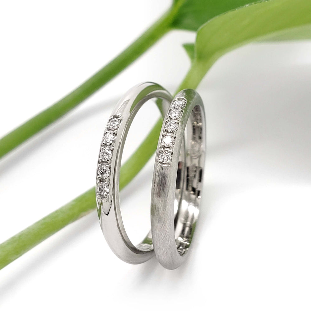 Pair of 14kt white gold wedding rings with Canadian diamonds, one polished, one matte