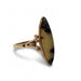 Profile view of vintage marquise agate ring with ornate 10kt yellow gold split-shank band