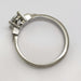 Profile view of 14kt white gold engagement ring with milgrain detail and lab diamond setting