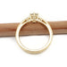 Profile view of 14k yellow gold engagement ring with wheat engraving and diamond setting