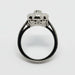 Profile view of Edwardian style white gold diamond ring with engraved details