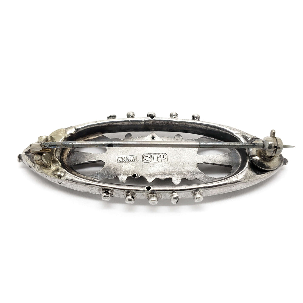 Back view of Victorian silver and rose gold pin showing hallmarks and pin clasp
