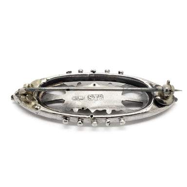 Back view of Victorian silver and rose gold pin showing hallmarks and pin clasp
