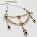 Back view of antique 14kt yellow gold lavaliere necklace with amethyst settings