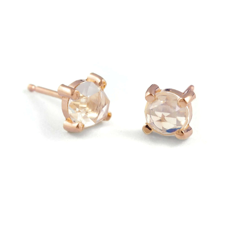 Rose cut moonstone stud earrings in 14kt rose gold on white background