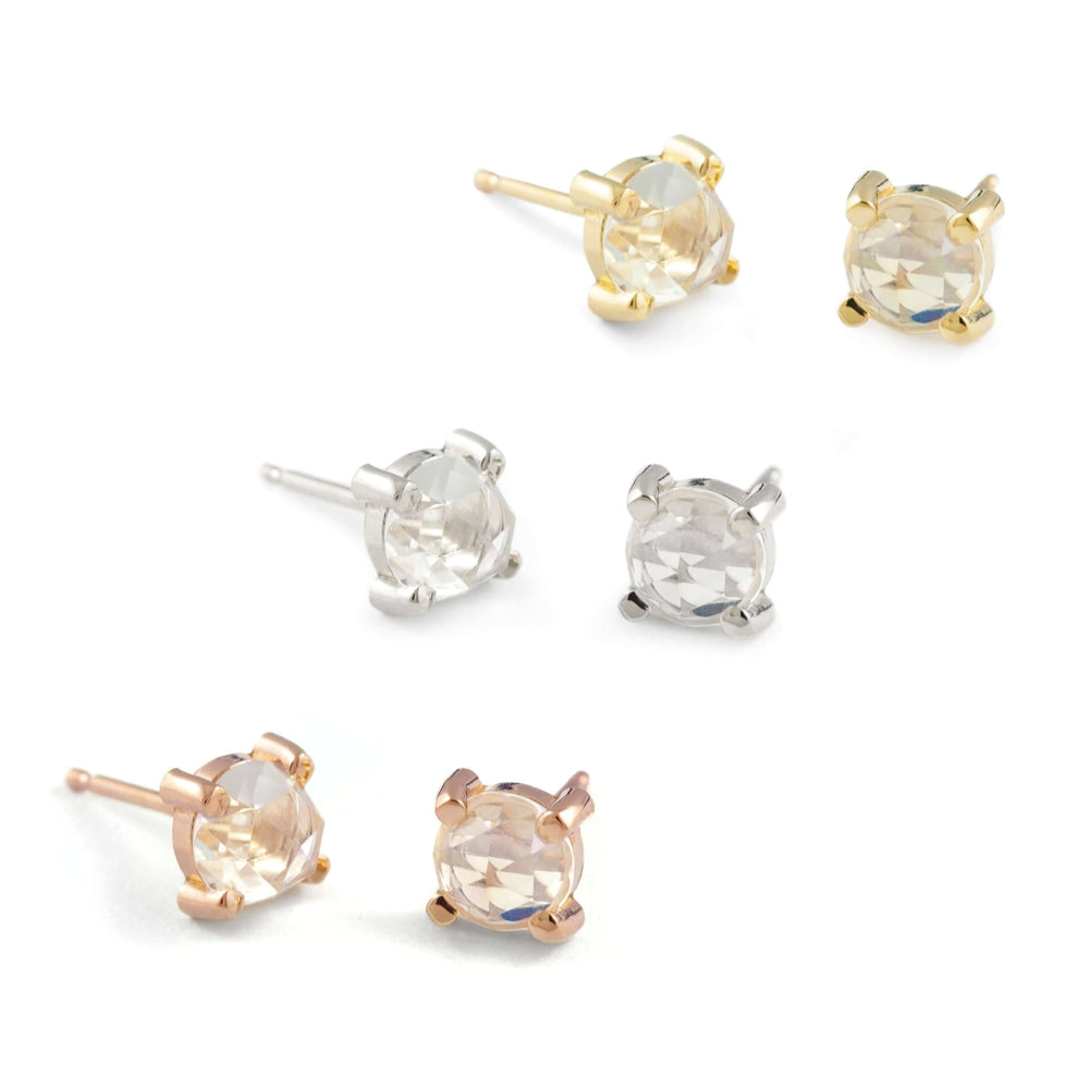 Rose cut moonstone stud earrings in 14kt yellow, white, and rose gold settings